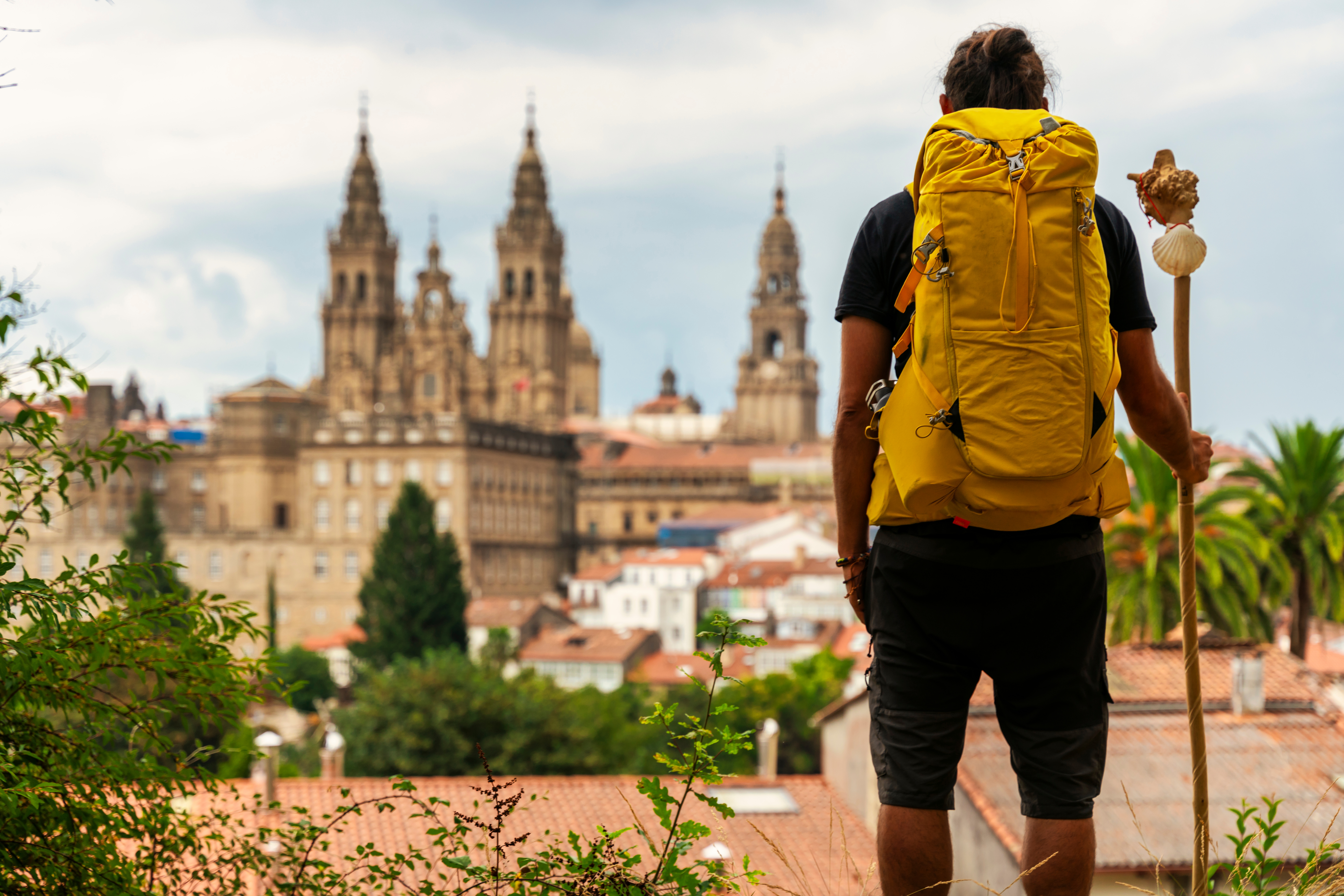 Pilgrims rejsende ved katedralen i Santiago de Compostela 